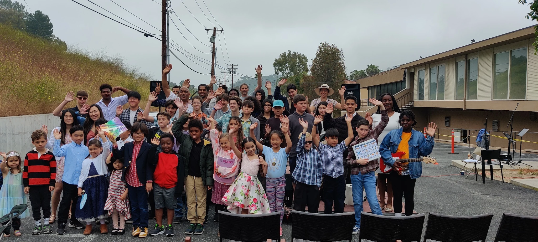 Joyful Music & Arts students gathered after a performance